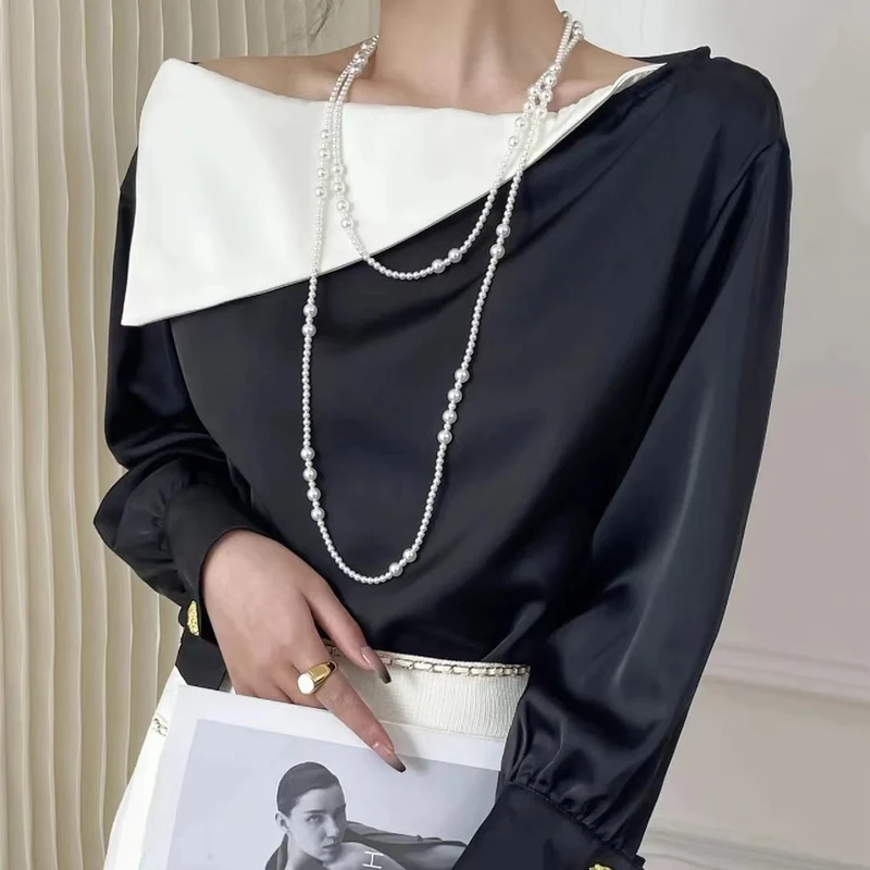 Multi-layer stacked Shijia pearl sweater chain long necklace women's round strong light Joker feeling autumn and winter accessories manufacturers batch