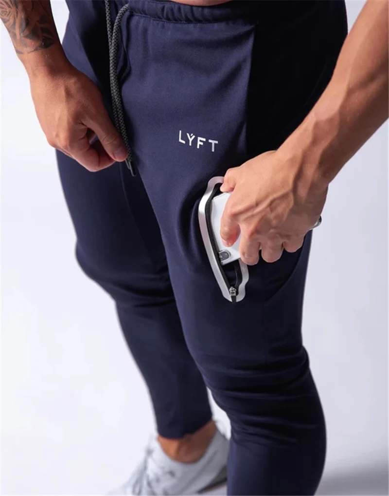 2019 Men's Sports Pants Men's Slim-Fit Elastic Invisible Zipper Casual Pants Stretch Cotton Foot-Retaining Pants Men's