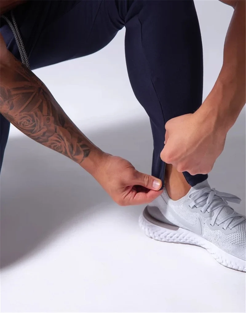 2019 Men's Sports Pants Men's Slim-Fit Elastic Invisible Zipper Casual Pants Stretch Cotton Foot-Retaining Pants Men's