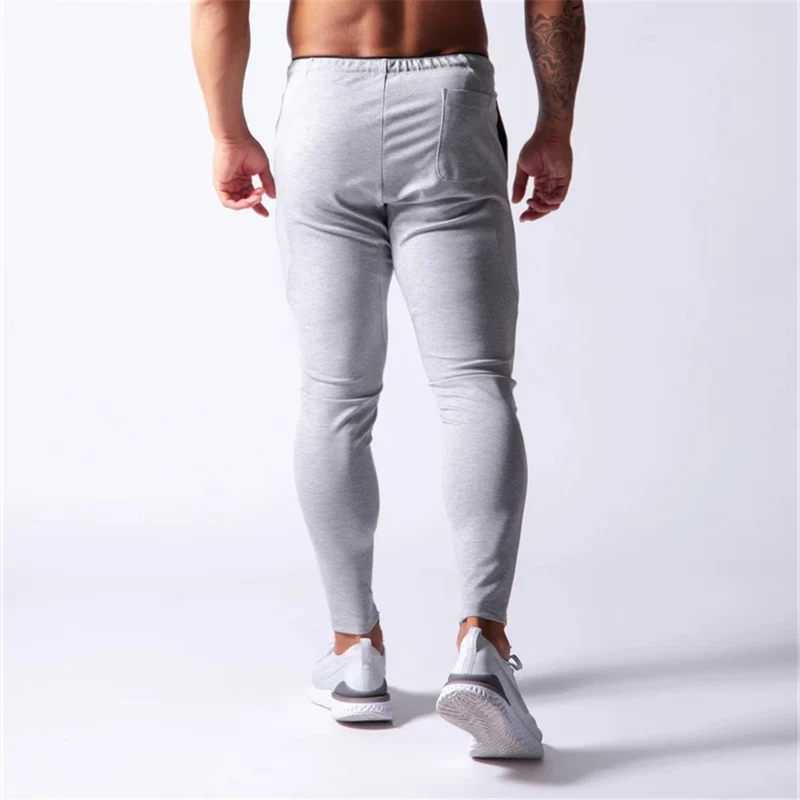 2019 Men's Sports Pants Men's Slim-Fit Elastic Invisible Zipper Casual Pants Stretch Cotton Foot-Retaining Pants Men's