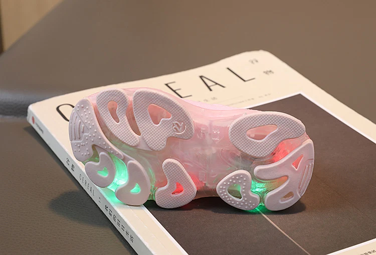 Spring LED lights men's and women's children's shoes factory direct breathable fly woven socks shoes luminous sports shoes spot
