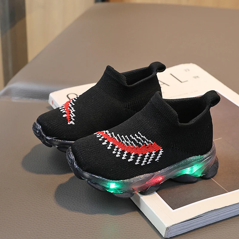 Spring LED lights men's and women's children's shoes factory direct breathable fly woven socks shoes luminous sports shoes spot
