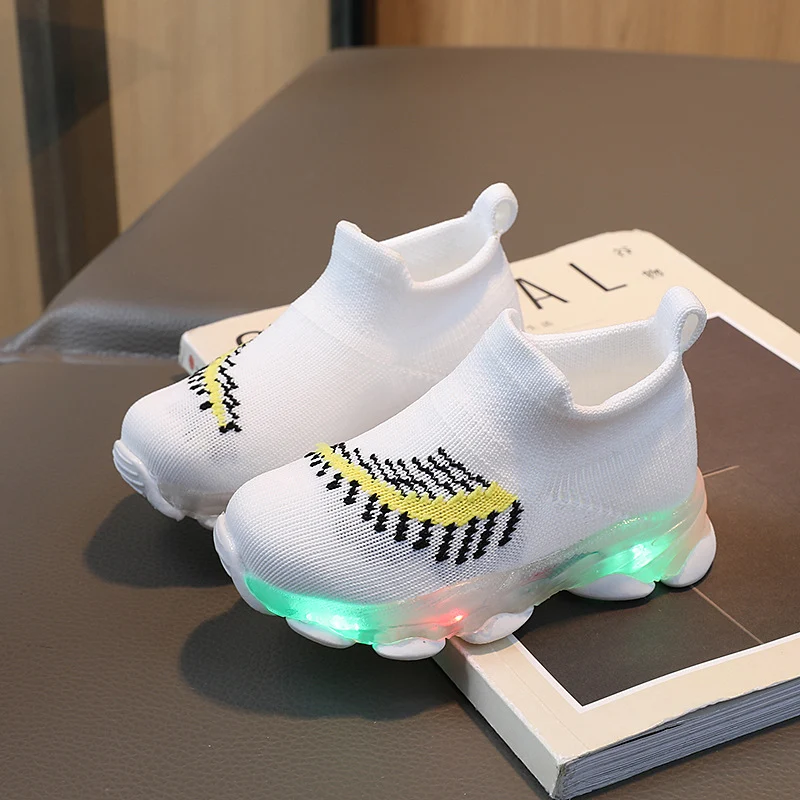 Spring LED lights men's and women's children's shoes factory direct breathable fly woven socks shoes luminous sports shoes spot