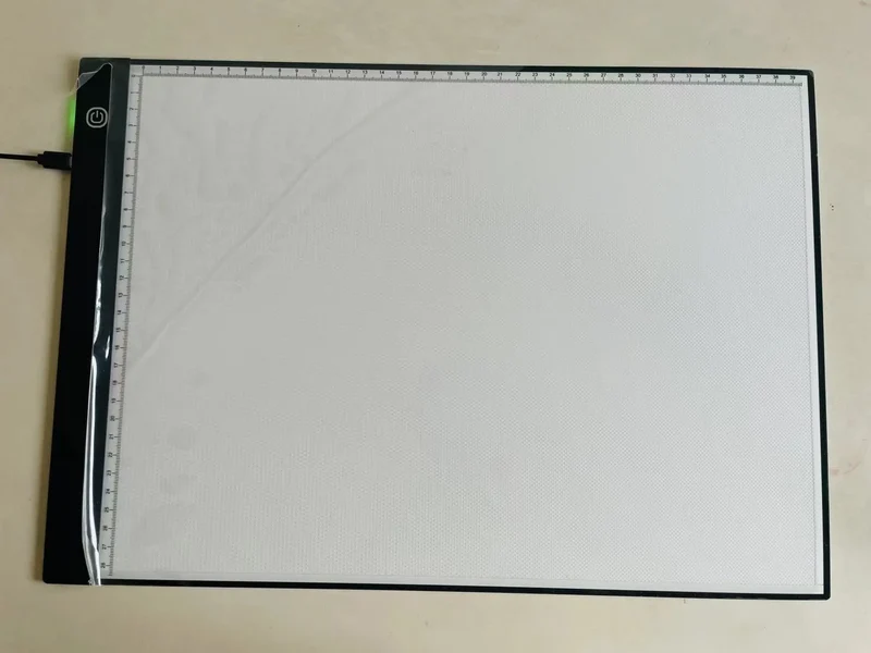 A3 Small Size Light Pad with Graduated Three-stage Adjustable Luminescent Backlight Illuminates the Drawing Board in the Dark.