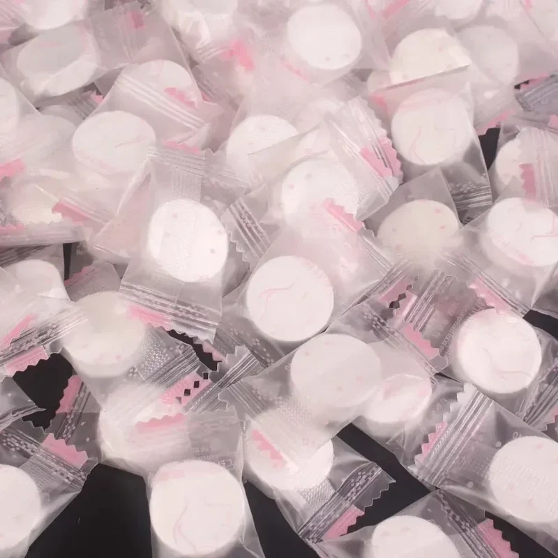 100pcs Disposable Compressed Facial Mask Portable Travel Non-woven Face Mask Skin Care Cotton Wrapped Masks Paper